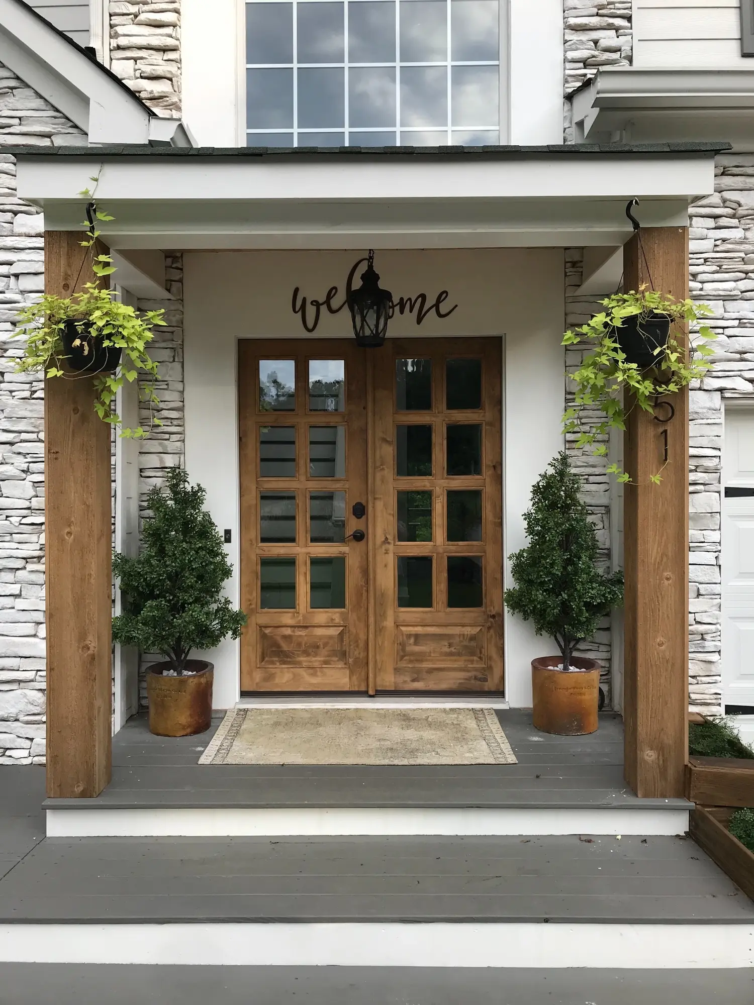 Exterior & Entry by Husky Cara Fine Homes