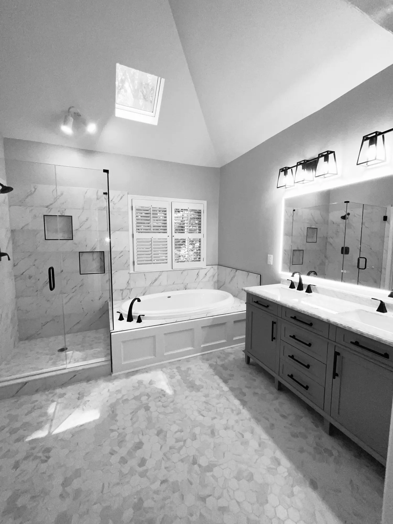 Boutique Hotel Shower by Husky Cara Fine Homes